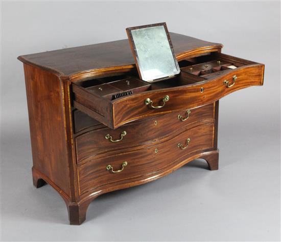 A George III satinwood banded mahogany serpentine commode, W.3ft 5in. D.1ft 9in. H.2ft 7in.